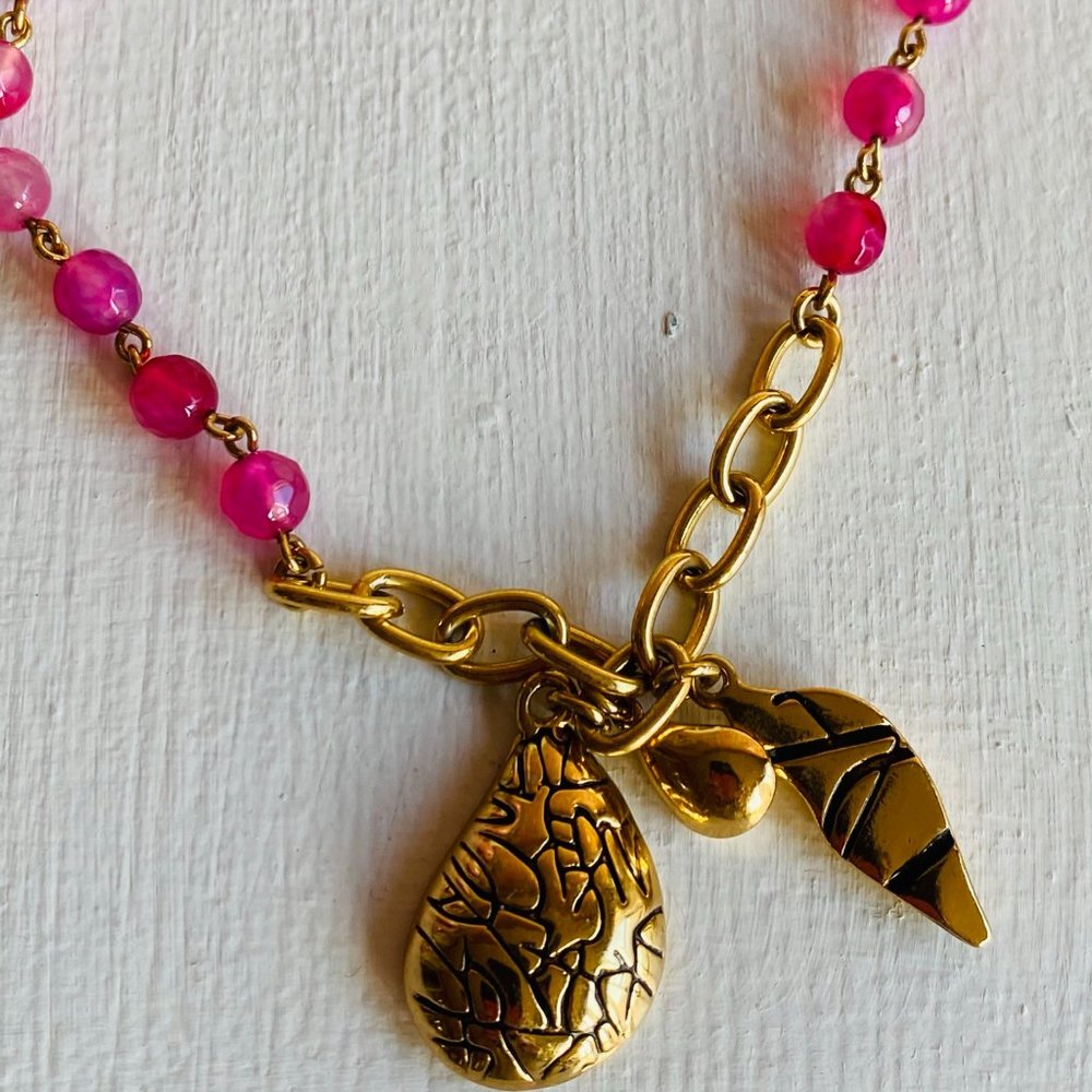 Long Pink Beaded Necklace with Unique Gold Charms